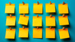 Yellow post its on a blue background with space to write text.