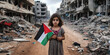 Palestinian girl holding Palestinian flag in Gaza