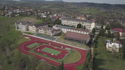 Wall Mural - Biech, Poland - 9 9 2018: Photograph of the old part of a small town from a bird's flight. Aerial photography by drone or quadrocopter. Advertise tourist places in Europe. Planning a medieval town.