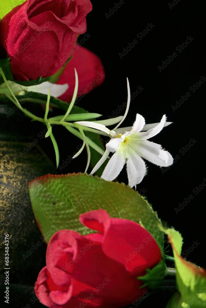 still life photography with artificial red roses in a vase Stock Photo ...