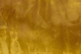 Fondo dorado. Papel dorado. Textura desnuda universal para pancarta, volante, presentación. Cubierta de fondo abstracta.