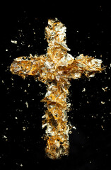 golden cross on black background