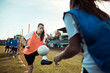 © Davor - Female soccer player kicking ball during practice