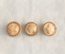 Christmas Fruit Mince Pies Decorated With A Star. Ivory Velvet Background