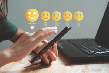 Customer review satisfaction feedback survey concept. Client give 5-star rate service experience on online application. Customers can evaluate quality of service leading to business reputation rating.