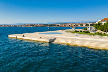 Canvas Print - Aerial shot of Zadar old town, famous tourist attraction in Croatia. Waterfront aerial summer view, Dalmatia region of Croatia. Drone.