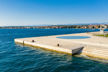 Wall Mural - Aerial shot of Zadar old town, famous tourist attraction in Croatia. Waterfront aerial summer view, Dalmatia region of Croatia. Drone.