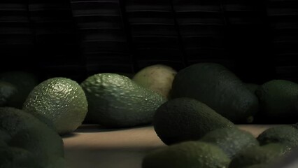 Poster - Avocados in a industrial conveyor belt 