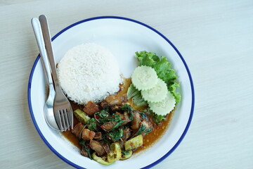 Wall Mural - Thai food: Stir-fried crispy pork with basil