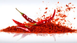 Fototapeta  - Chili, red pepper flakes and chili powder burst isolated on white background.