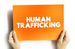 canvas print picture - Human Trafficking is the trade of humans for the purpose of forced labour, text concept on card for presentations and reports