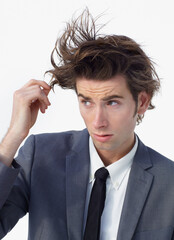 Wall Mural - Chaos, crazy hair and business man with doubt and confused from stress and anxiety. Studio, male professional and working with corporate job and thinking with wild hairstyle and white background