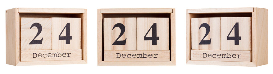 Canvas Print - Wooden calendar, a set of dates of the month 24 December, on a white and transparent background close-up