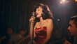 © annebel146 - Vintage performer. Singing Woman with Microphone. Beauty Glamour Singer Girl Portrait in club. Vintage Style. Song elegant female
