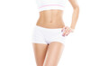 © Acronym - Young, fit and beautiful woman in white swimsuit over white background. Healthcare, diet, sport and fitness concept.