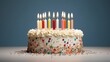 © Ghazanfar - Celebration birthday cake with colorful sprinkles and twenty one colorful birthday candles.