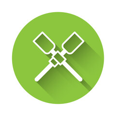 Poster - White Oars or paddles boat icon isolated with long shadow background. Green circle button. Vector