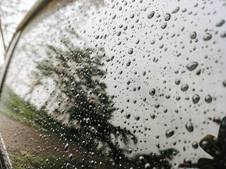 Water or raindrops on a car. Abstract texture background. Selective or soft focus.