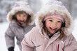 © dinastya - Cute little kids playing in snow in winter outside.  Banner for a store of winter warm children clothing, pink jackets and overalls with down insulation, comfortable winter.