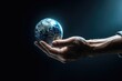 A person holding a small earth in their hand. This image can be used to represent concepts such as environmental conservation, global issues, unity, and sustainability