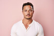 © vvalentine - medium shot portrait of a man in his 30s against a light pink background, generative ai