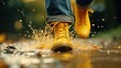  close up of yellow boots in vigorous nature walking and rainy conditions