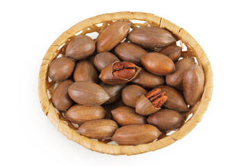 Poster - pecan nut in a wicker basket isolated on white background with full depth of field. Top view. Flat lay.