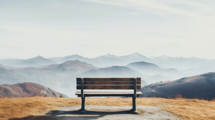 Sticker -  a wooden bench sitting on top of a grass covered field next to a mountain covered with snow covered mountains in the distance.