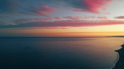 Wall Mural - Sunset cloudy sky and ocean background