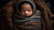 A sleeping newborn baby swaddled or wrapped in a dark colored blanket.