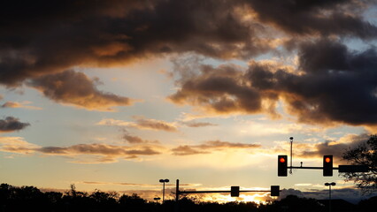 Wall Mural - the beautiful sunset view with the colorful clouds and warm sunlight