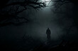 Silhouette of a man in the dark forest at night with fog. Halloween concept