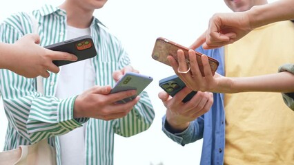 Poster - Multinational youth group showing their smart phone. Social network. Mobile app.