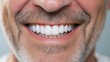 Middle age man smiling with clean teeth, taking care of teeth,  Dental health care concept