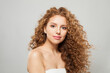 © artmim - Nice woman fashion model with long wavy hairstyle, natural makeup and clear skin. Haircare, facial treatment and skincare concept
