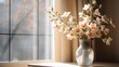 Delicate spring flowers in a glass vase on the window in a cozy country house. Illuminated by the morning sunlight.
