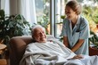 Healthcare and medicine. Old man in a nursing home with a nurse beside him.