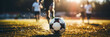 Soccer player controls ball with foot in stadium action close-up 