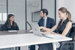 © NOPPHINAN - Group of business people discussing the charts and graphs showing the results of their successful teamwork, Business concept meeting in the office.