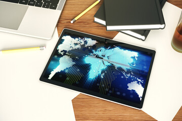 Poster - Abstract creative world map on modern digital tablet monitor, tourism and traveling concept. Top view. 3D Rendering