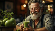 Happy elderly man drinking a green smoothie.