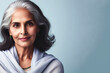 portrait of a graceful senior indian woman, senior Indian woman looking in camera on bright background. ai generative
