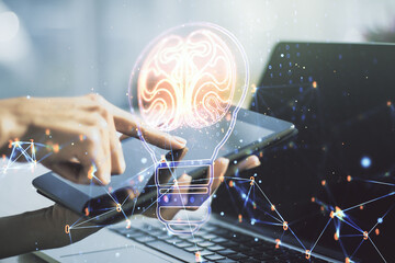 Poster - Creative idea concept with light bulb and human brain illustration and with finger clicks on a digital tablet on background. Neural networks and machine learning concept. Multiexposure