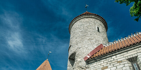 Sticker - Tallinn, Estonia - July 15, 2017: Tallinn streets and medieval buildings on a sunny summer day