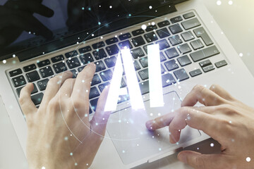Poster - Creative artificial Intelligence symbol concept with hands typing on laptop on background. Multiexposure