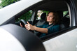 © scharfsinn86 - Woman driver is sitting in the car
