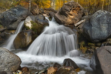 Canvas Print - Russia. Russia. The South of Western Siberia, the Altai Mountains. Small waterfalls on the Katuyaryk River in the valley of the Chulyshman River.