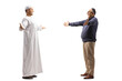 © Ljupco Smokovski - Mature man meeting a muslim man in ethnic clothes