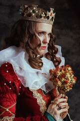 Sticker - sad medieval queen in red dress with dried flower