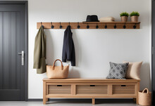 Wall-mounted Coat Rack Above Rustic Bench. Farmhouse Interior Design Of Modern Entrance Hall.